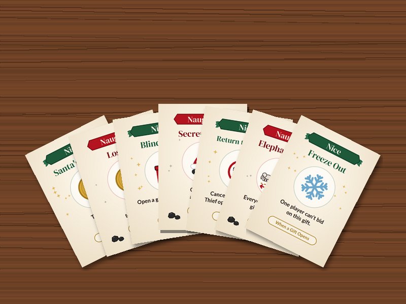 A fan of Naughty or Nice cards, including Freeze Out, Elephant Walk, and Blind Luck